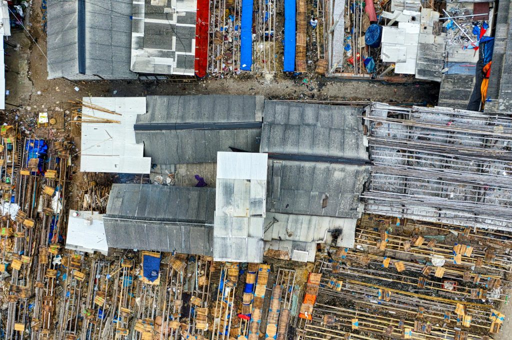 An aerial view of a construction site with many metal structures